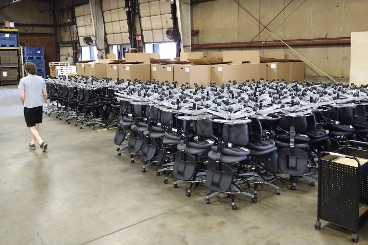 order of fully assembled seating prepared for blanket wrapping and shipping